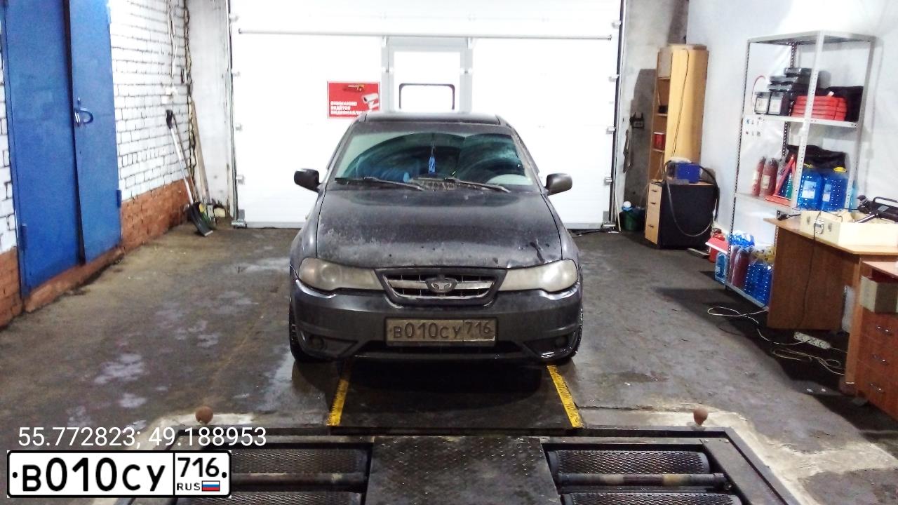 Фото автомобиля DAEWOO NEXIA, 2010 — госномер В010СУ716. Цвет: Бледно-Черный