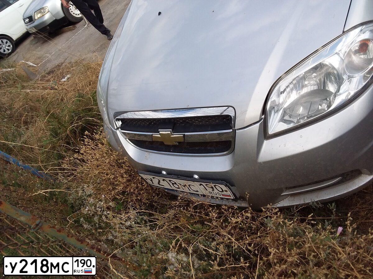 Фото автомобиля CHEVROLET AVEO, 2010 — госномер У218МС190. Цвет: СЕРЕБРИСТЫЙ