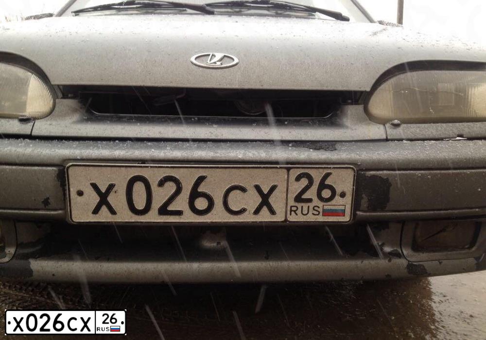 Фото автомобиля LADA 2170 PRIORA, 2008 — госномер Х026СХ26. Цвет: Темно-зеленый