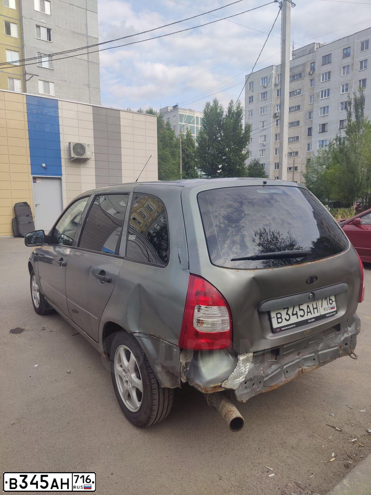 Фото автомобиля LADA 1117 KALINA, 2011 — госномер В345АН716. Цвет: Темно-серый металлик