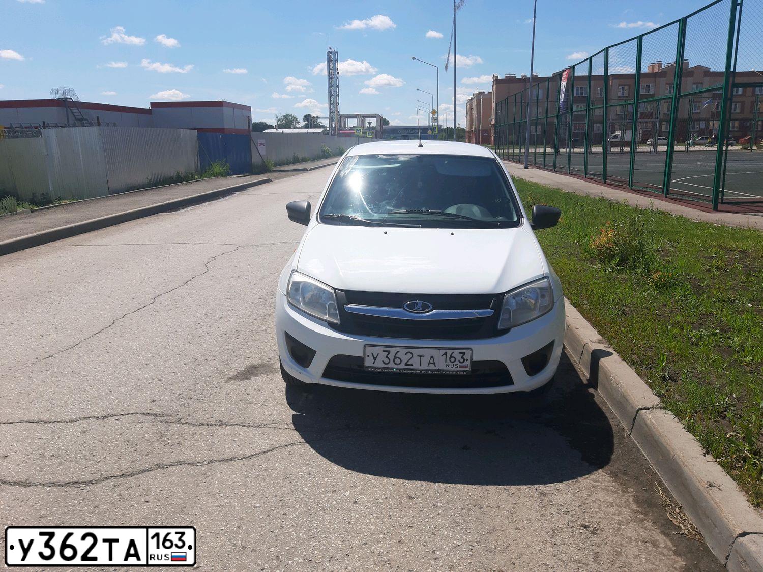 Фото автомобиля LADA 2190 GRANTA, 2015 — госномер В752ВТ09. Цвет: Белый