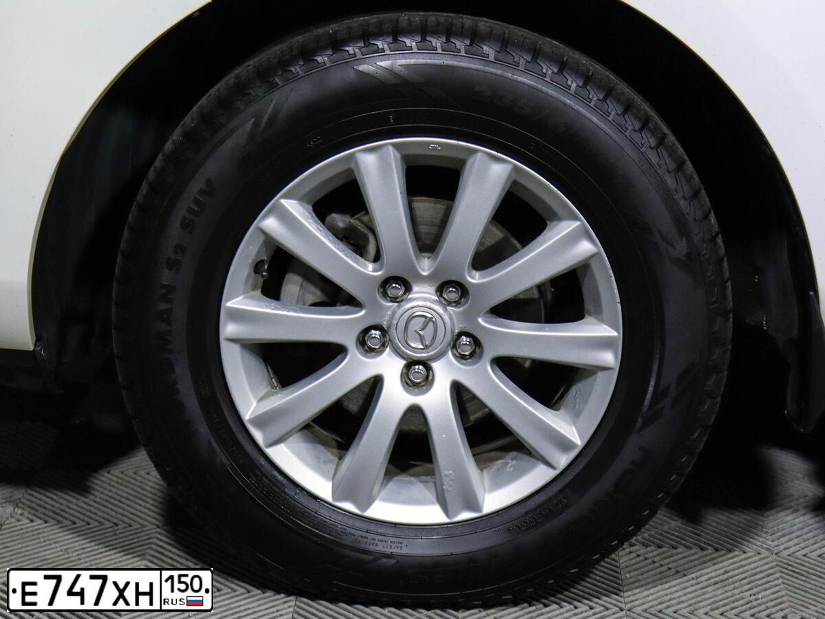 Фото автомобиля MITSUBISHI LANCER, 2008 — госномер Е747ХН150. Цвет: БЕЖЕВЫЙ