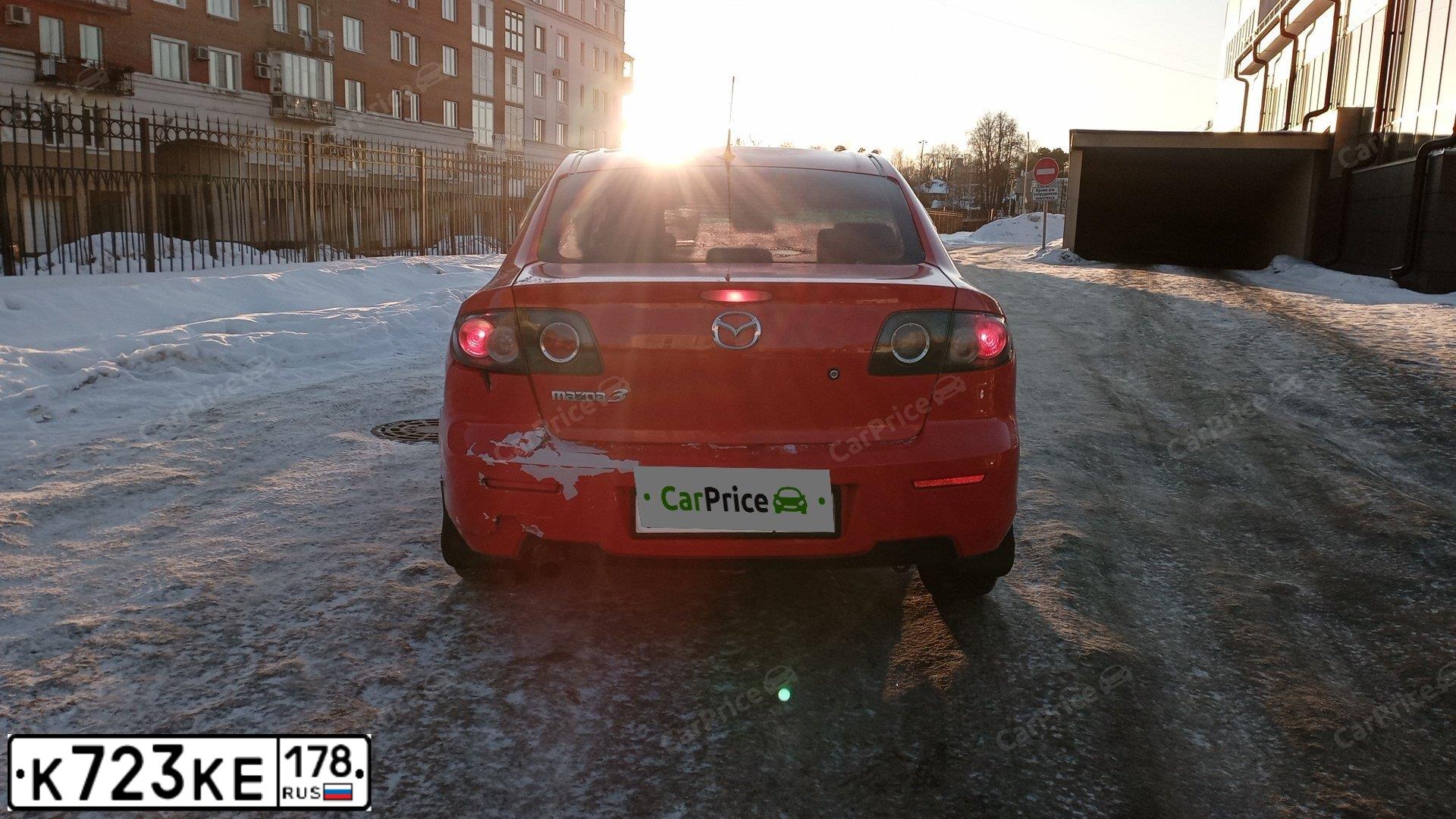 Фото автомобиля MAZDA 3, 2007 — госномер Р820МЕ198. Цвет: Красный