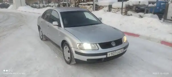 Фото автомобиля VOLKSWAGEN PASSAT, 1999 — госномер К100УМ62. Цвет: Серебристый