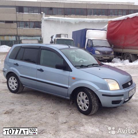 Фото автомобиля HYUNDAI TUCSON, 2007 — госномер В495УТ154. Цвет: ЧЕРНЫЙ