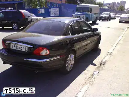 Фото автомобиля JAGUAR X-TYPE, 2003 — госномер Т515НС52. Цвет: ЧЕРНЫЙ