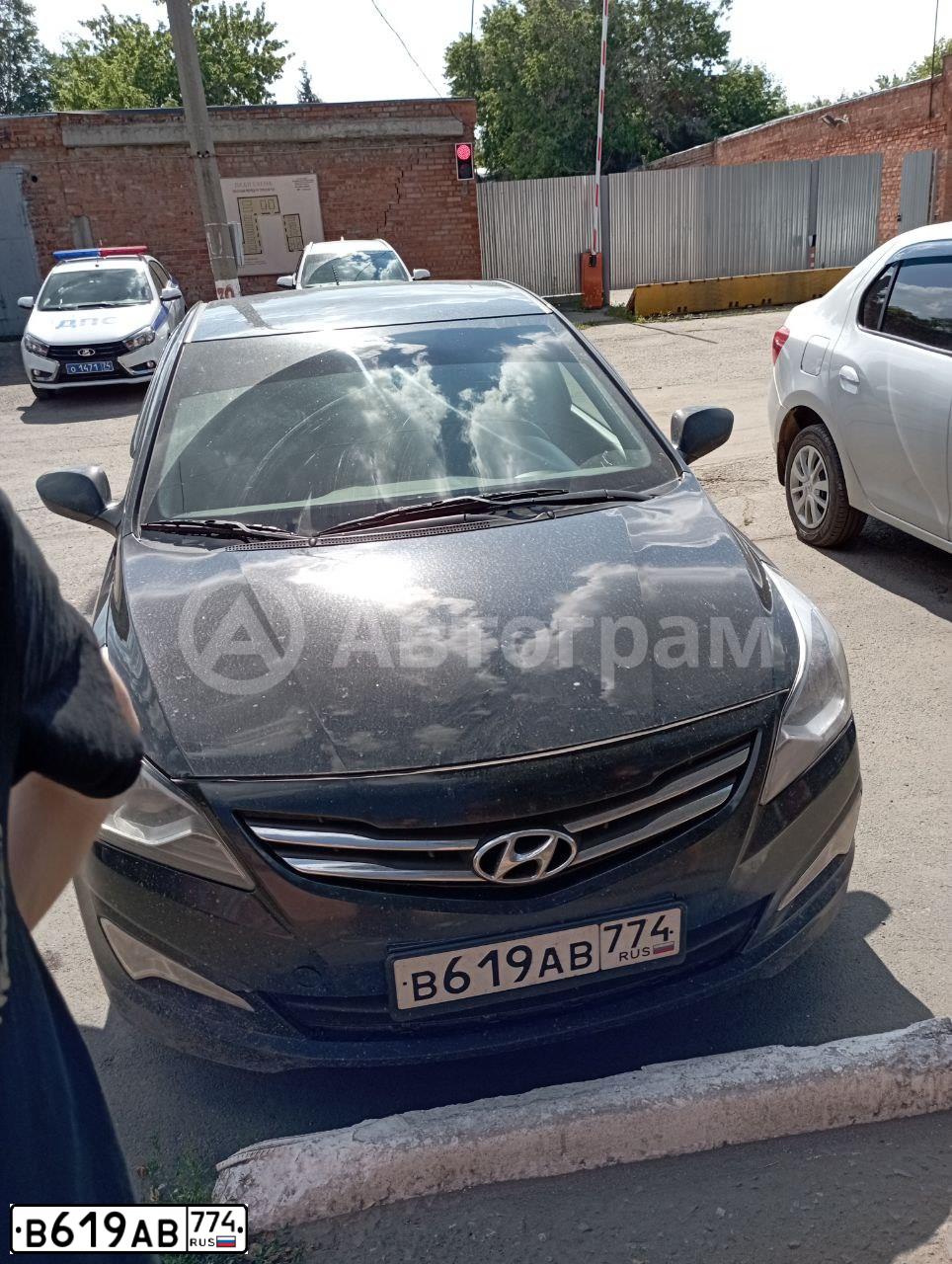 Фото автомобиля HYUNDAI SOLARIS, 2014 — госномер Е174ЕХ174. Цвет: ЧЕРНЫЙ