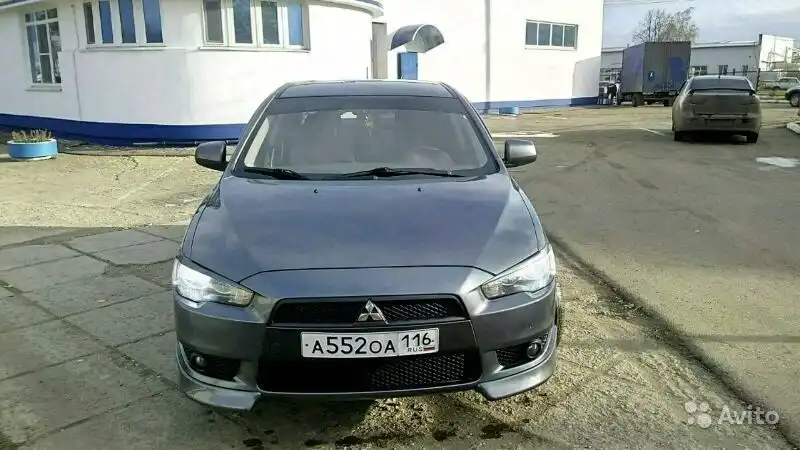Фото автомобиля MITSUBISHI LANCER, 2008 — госномер В016АУ116. Цвет: СЕРЫЙ