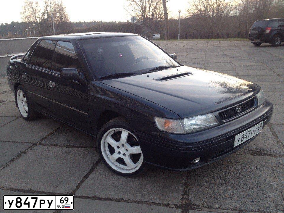 Фото автомобиля SUBARU LEGACY, 1994 — госномер Т471ЕМ90. Цвет: ЧЕРНЫЙ