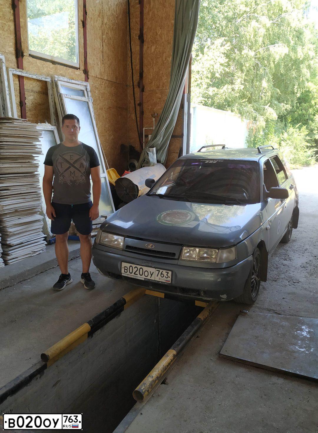 Фото автомобиля LADA 2111 LADA, 2000 — госномер Е390НО63. Цвет: ТЕМНО-СЕРО-СИНИЙ