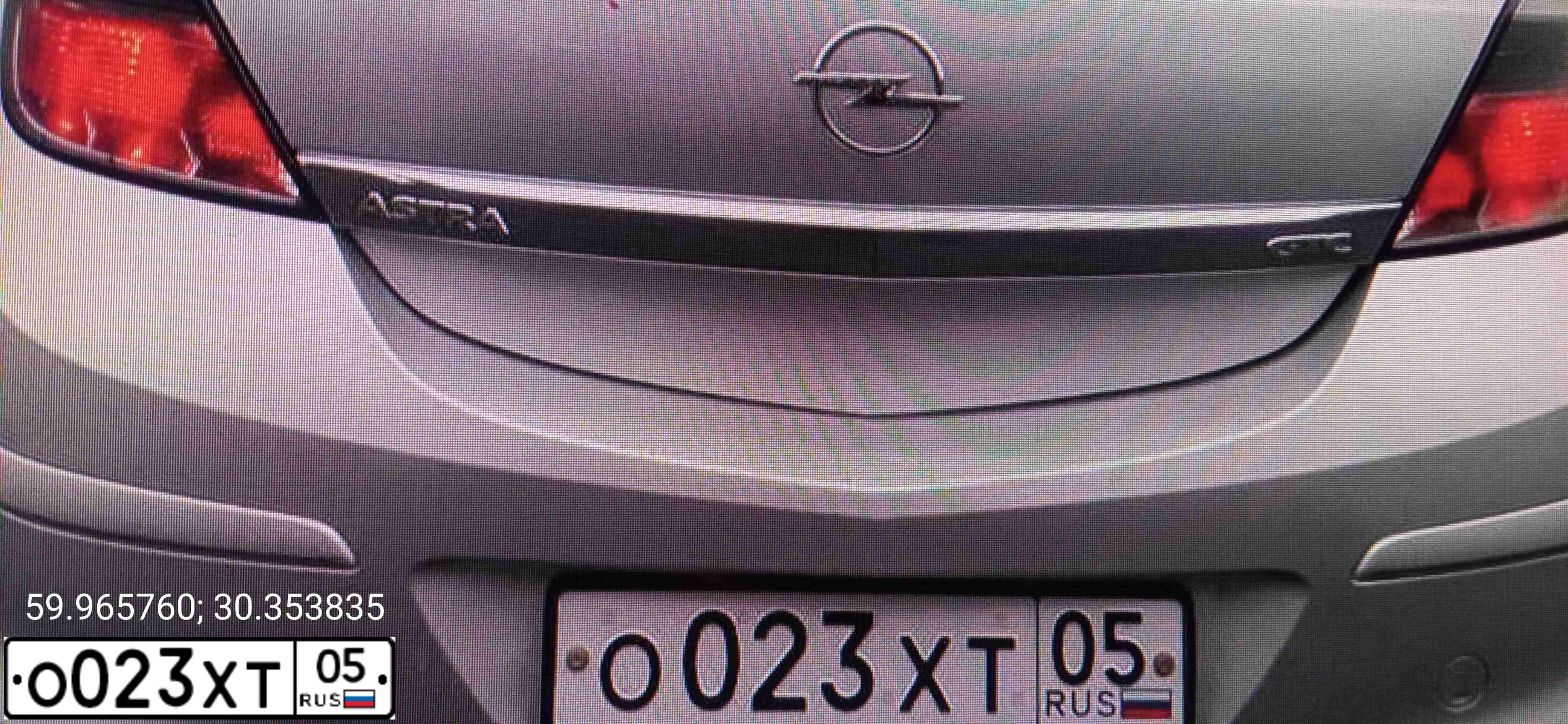 Фото автомобиля OPEL ASTRA, 2008 — госномер Р214НТ790. Цвет: Серебристый
