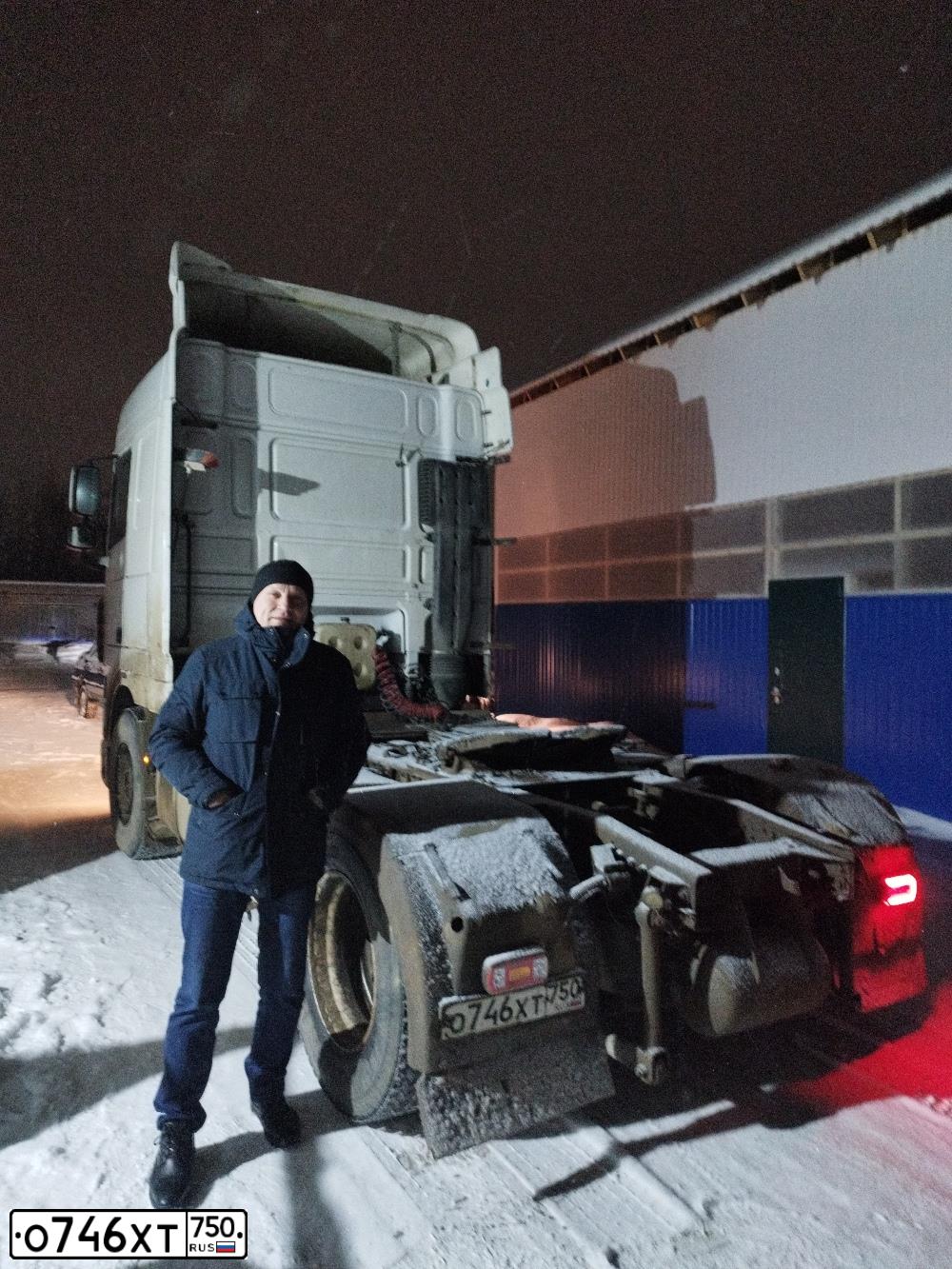 Фото автомобиля DAF XF 95 FT /4X2/, 2011 — госномер О298УР29. Цвет: Белый