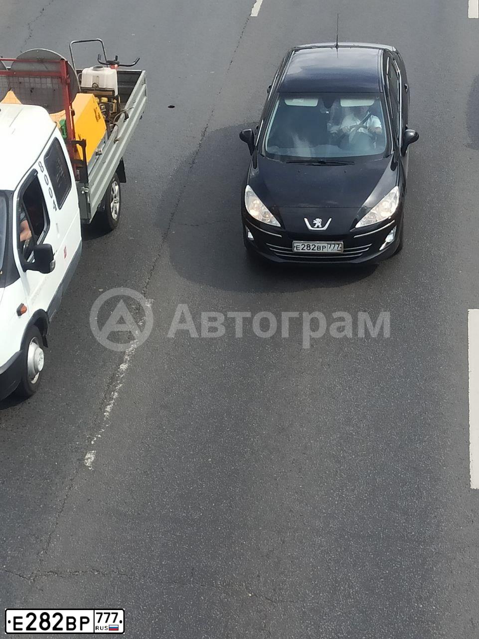 Фото автомобиля PEUGEOT 408, 2013 — госномер Е282ВР777. Цвет: ЧЕРНЫЙ