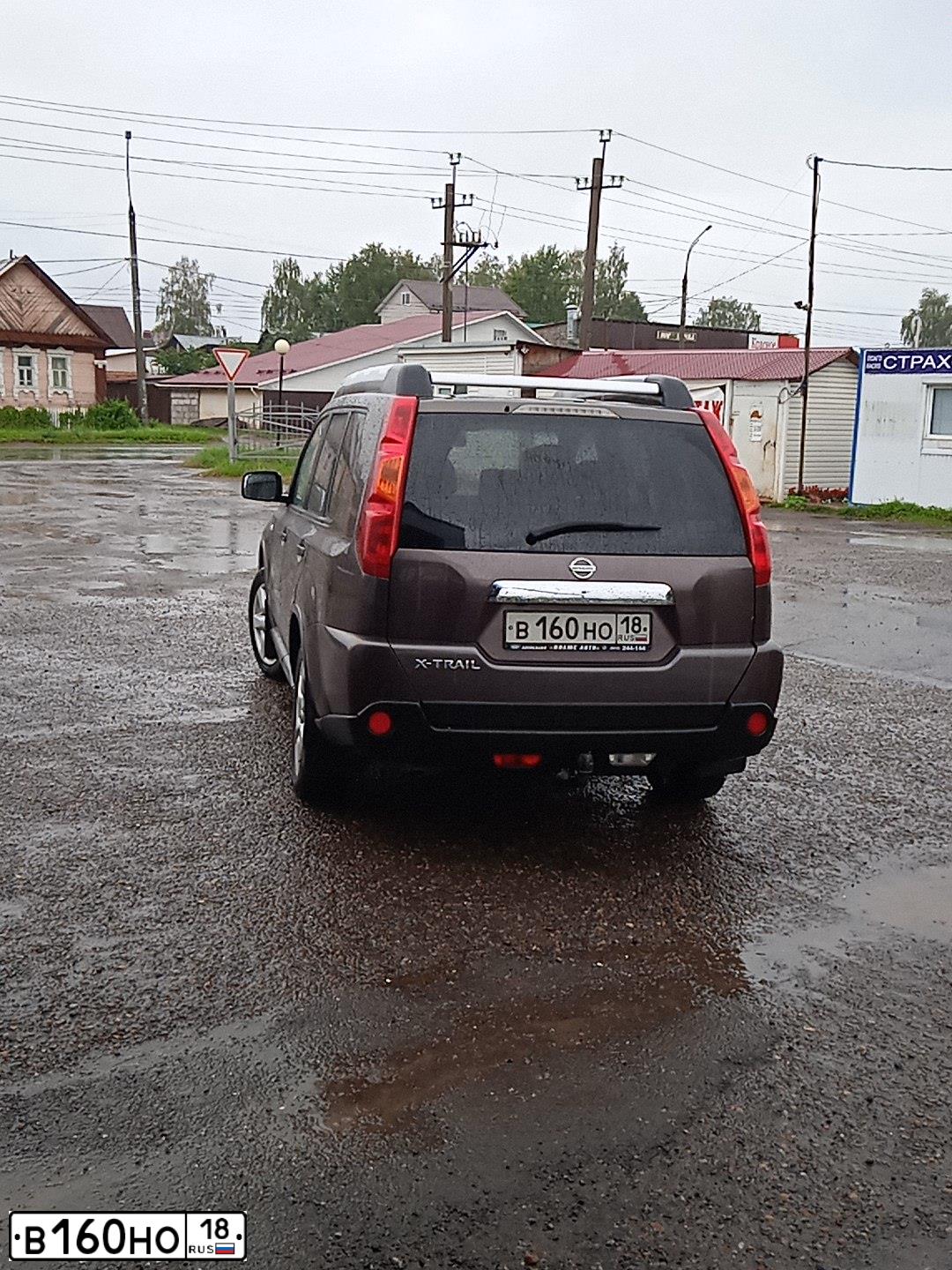 Фото автомобиля NISSAN X-TRAIL, 2008 — госномер Е962ТМ702. Цвет: СЕРО-СИРЕНЕВЫЙ