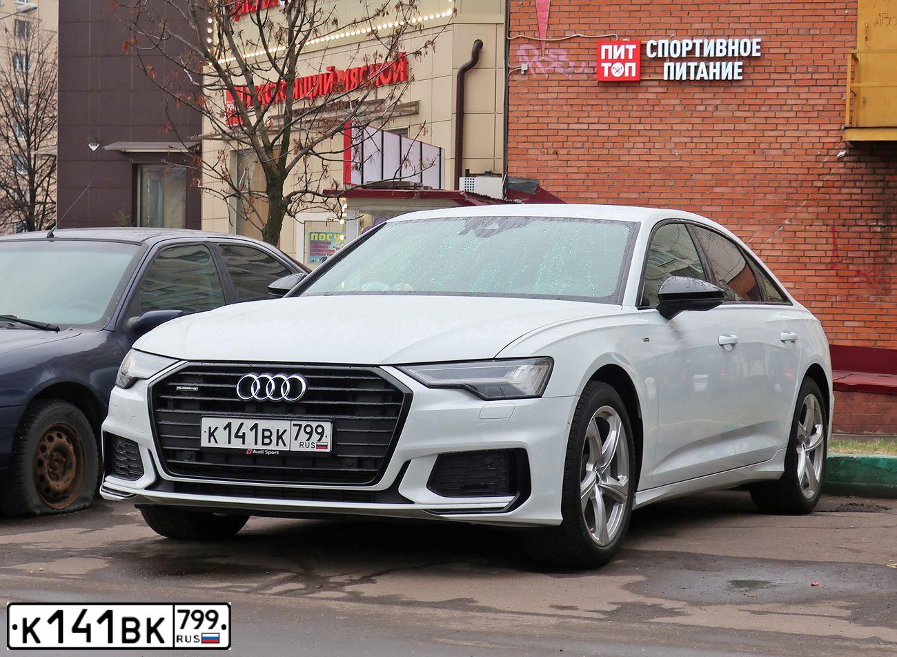 Фото автомобиля AUDI A4, 2017 — госномер К141ВК799. Цвет: ЧЕРНО-СЕРЫЙ