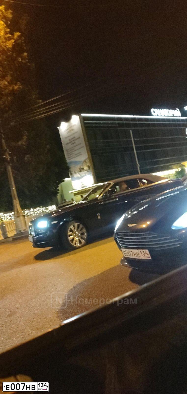 Фото автомобиля ASTON MARTIN N DB 11, 2018 — госномер Е134КС134. Цвет: ТЕМНО-КОРИЧНЕВЫЙ