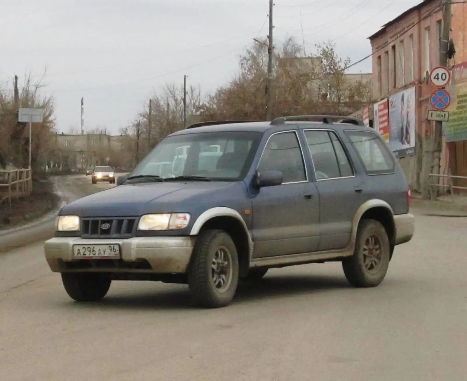 Фото автомобиля KIA SPORTAGE, 2003 — госномер О130МР150. Цвет: ЗЕЛЕНЫЙ