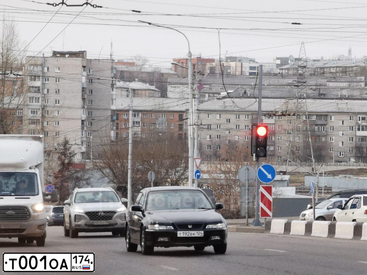 Фото автомобиля TOYOTA HIGHLANDER, 2011 — госномер Т001ОА174. Цвет: ЧЕРНЫЙ
