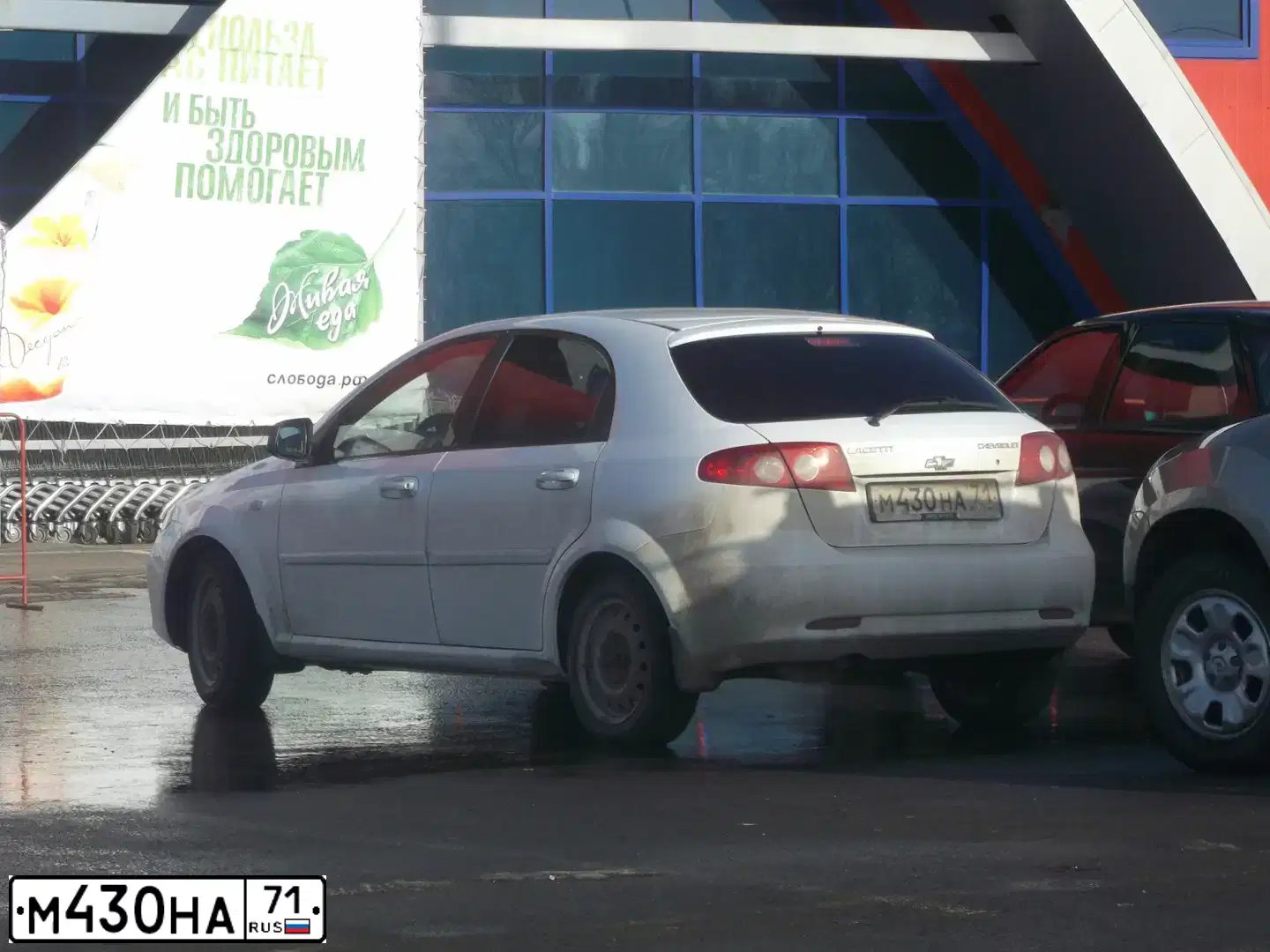 Фото автомобиля CHEVROLET LACETTI, 2011 — госномер У373СУ71. Цвет: Белый