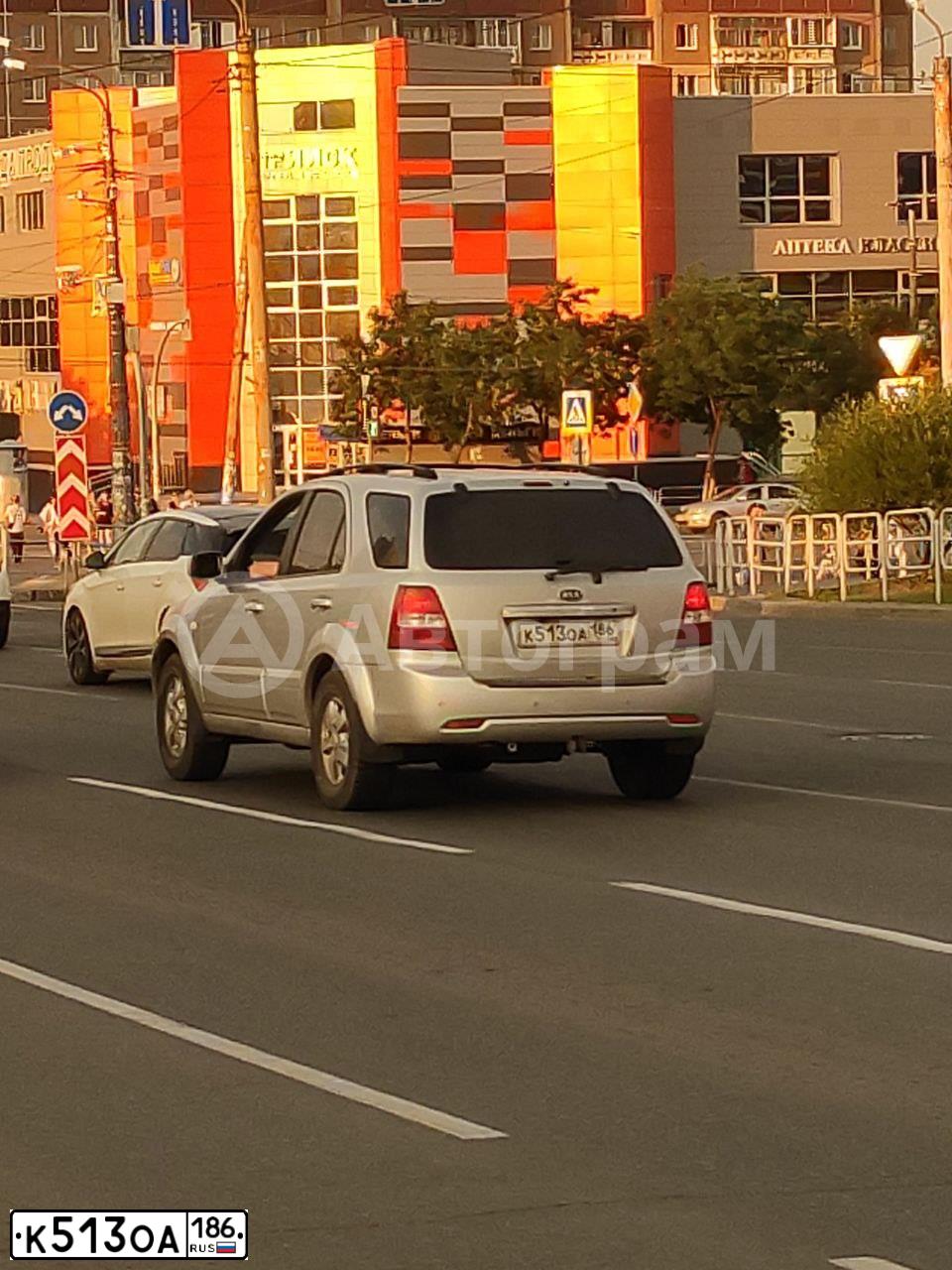 Фото автомобиля KIA SORENTO, 2007 — госномер Е095ХР152. Цвет: Чистое серебро