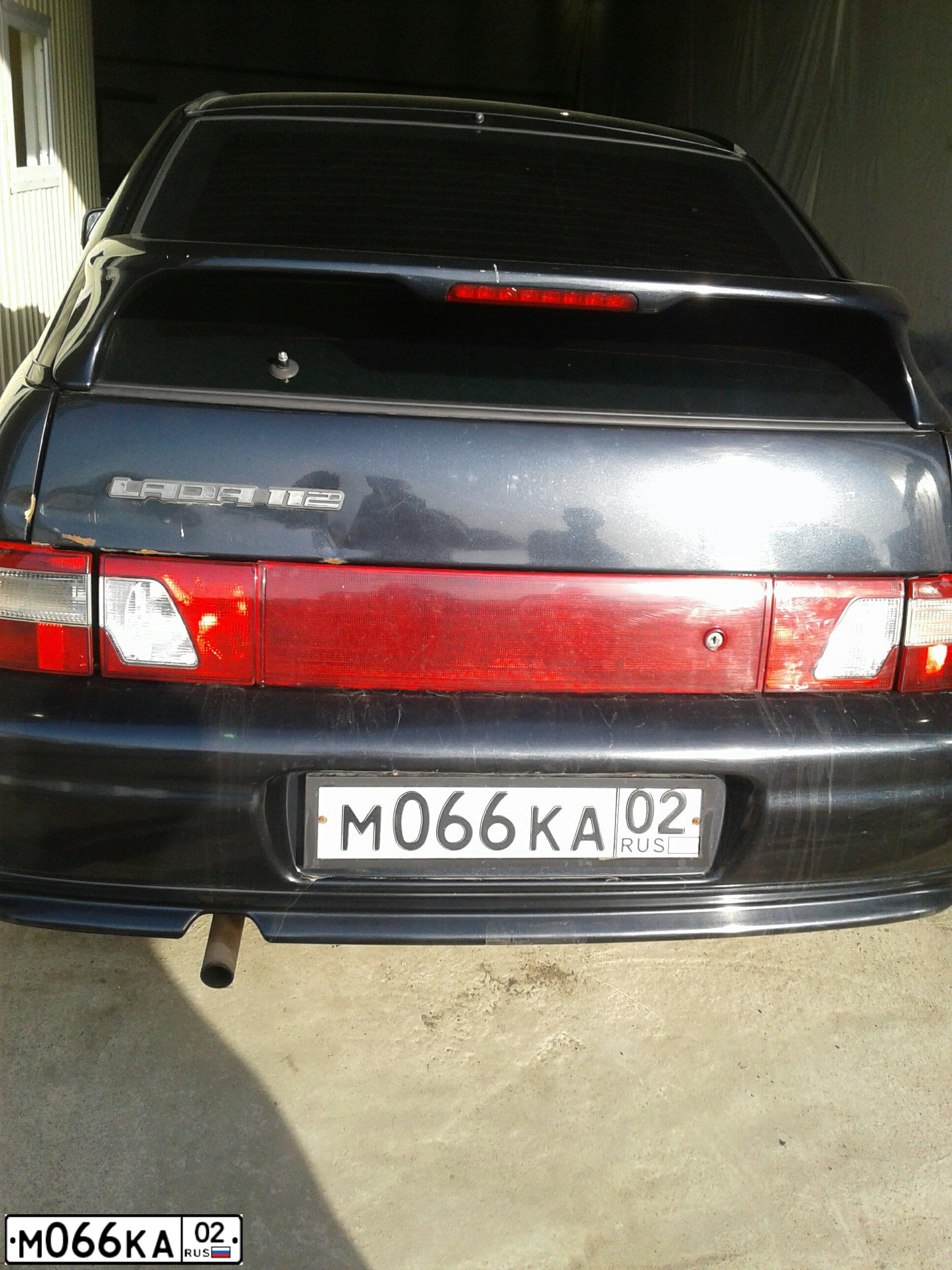 Фото автомобиля LADA 2112 LADA, 2006 — госномер М066КА02. Цвет: ГРАФИТОВЫЙ МЕТАЛЛИК