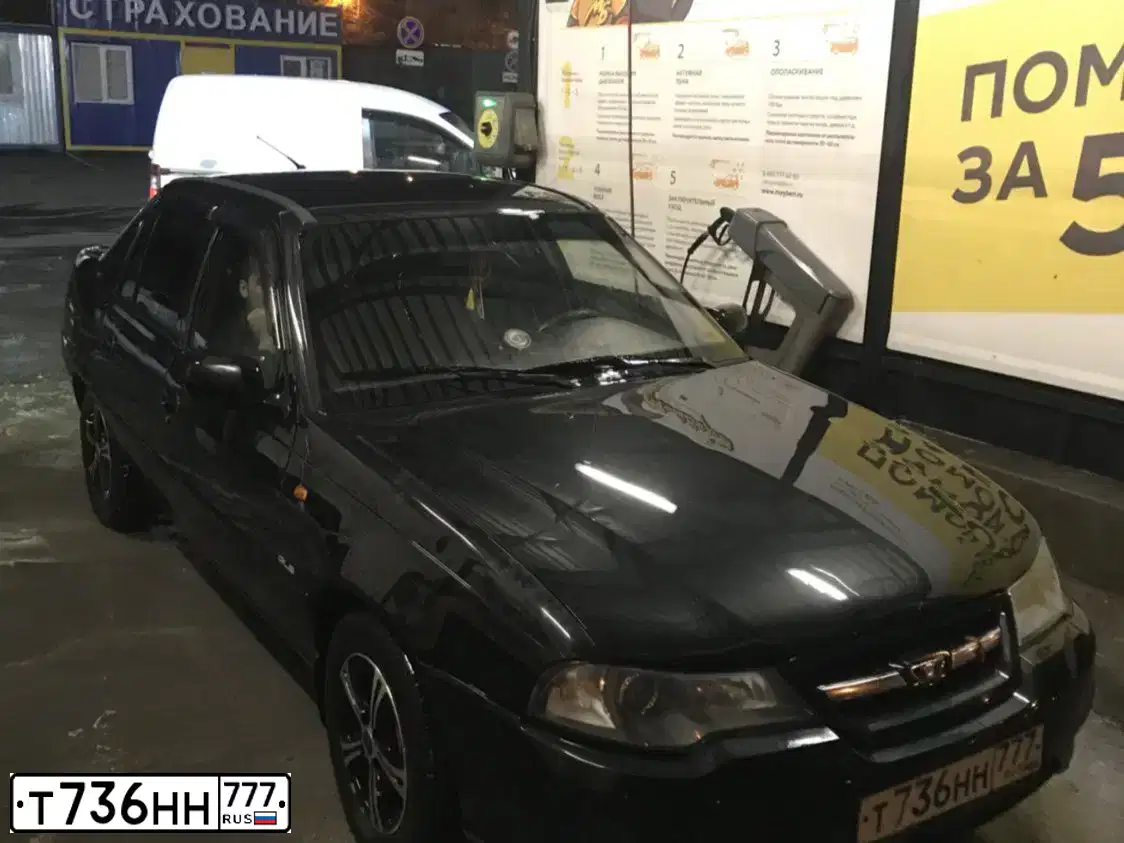 Фото автомобиля DAEWOO NEXIA, 2010 — госномер А248УН69. Цвет: ЧЕРНЫЙ БЛЕДНЫЙ