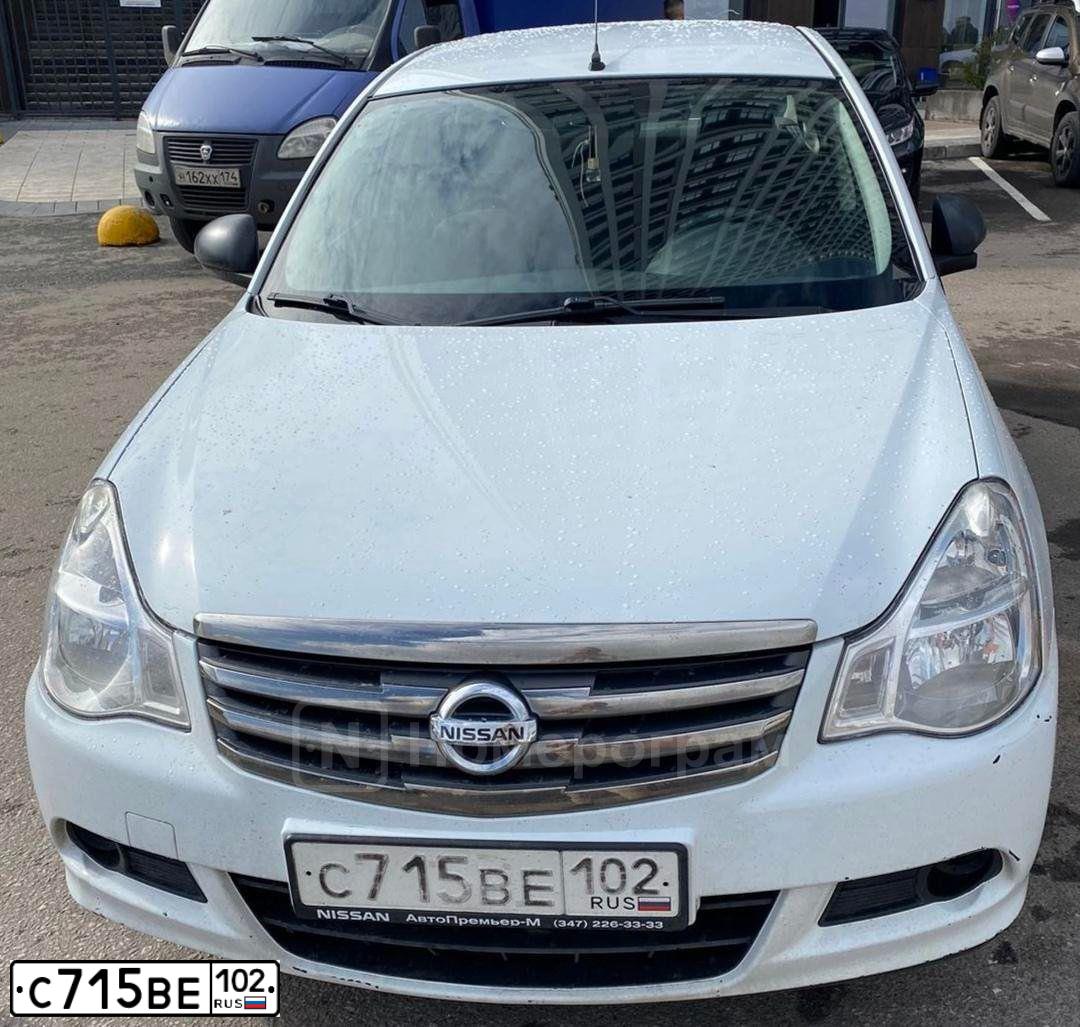Фото автомобиля NISSAN ALMERA /AVTOVAZ/, 2014 — госномер С715ВЕ102. Цвет: Белый
