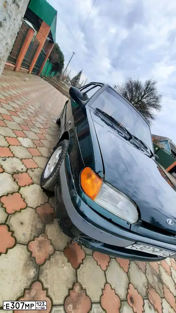 Фото автомобиля LADA 2114 SAMARA, 2003 — госномер Х131АУ193. Цвет: Темно-зеленый