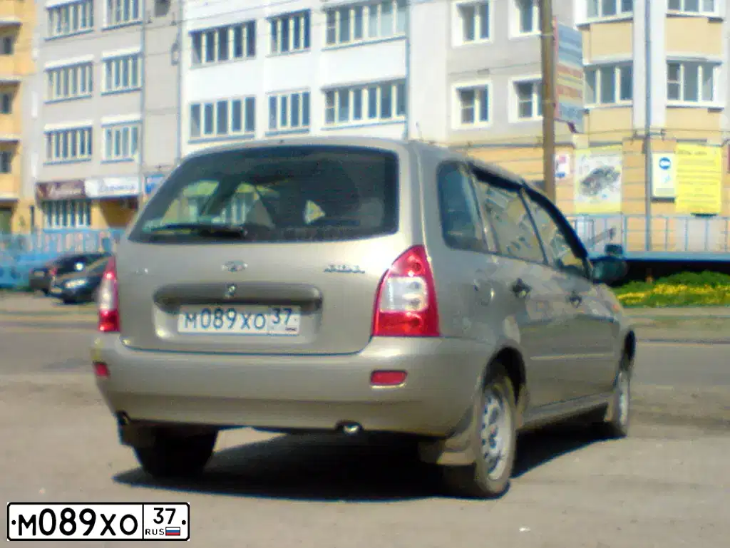 Фото автомобиля LADA 1117 KALINA, 2009 — госномер А074ТС37. Цвет: БЕЖЕВО-СЕРЫЙ