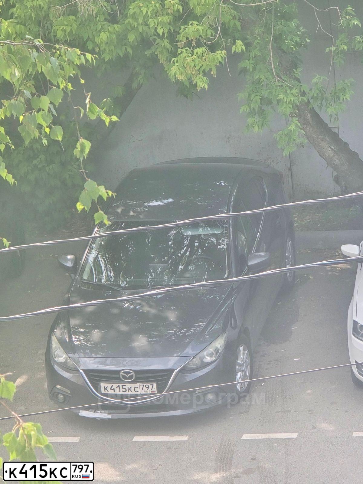 Фото автомобиля MAZDA A 3, 2014 — госномер К415КС797. Цвет: ТЕМНО-СЕРЫЙ
