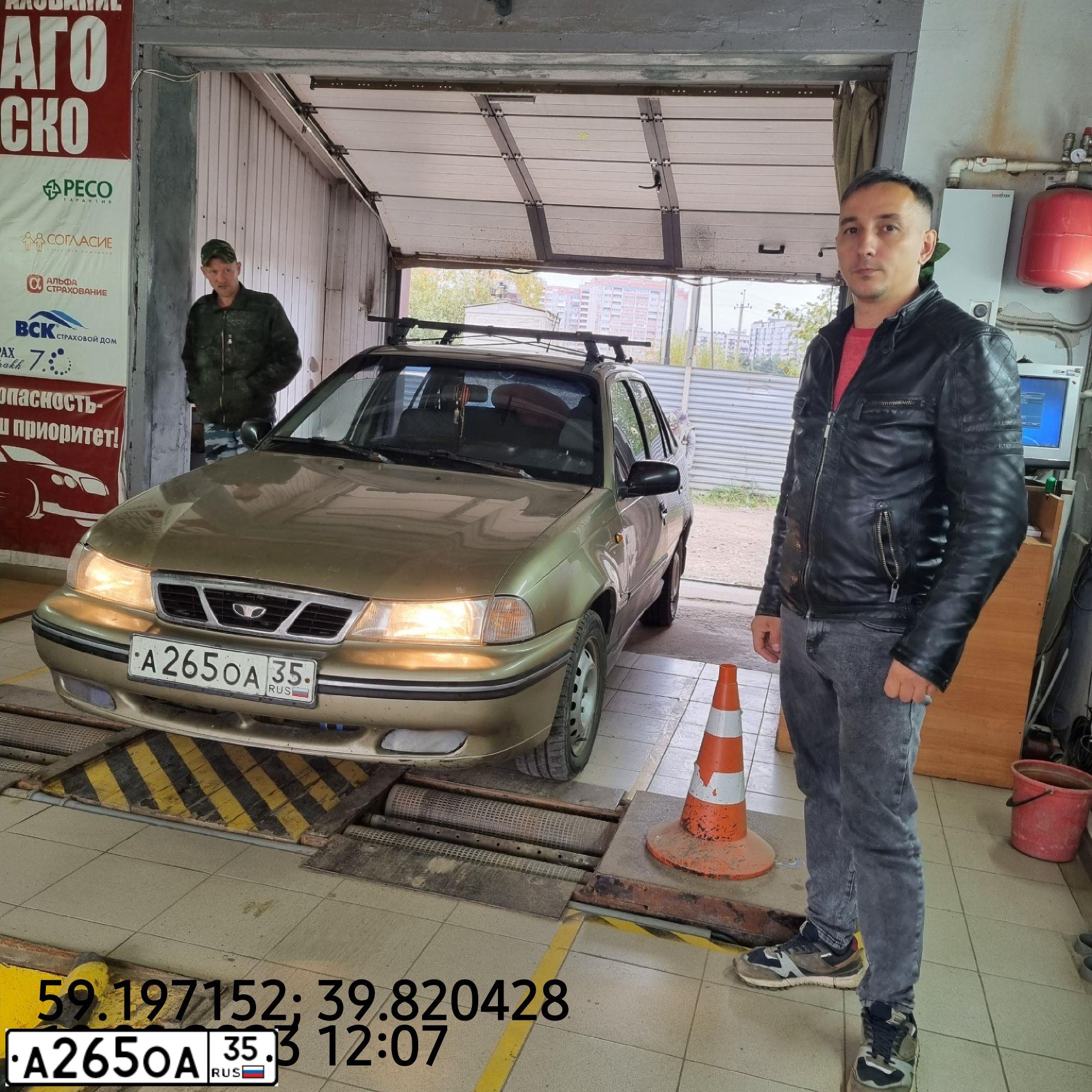 Фото автомобиля DAEWOO O NEXIA, 2006 — госномер А265ОА35. Цвет: ПЕСОЧНЫЙ