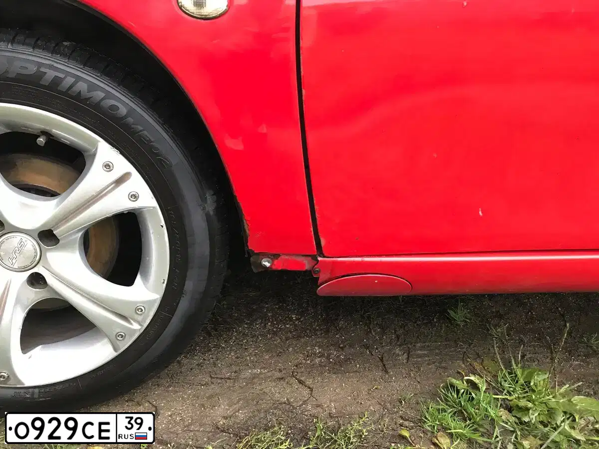 Фото автомобиля OPEL TIGRA, 1995 — госномер О929СЕ39. Цвет: Красный