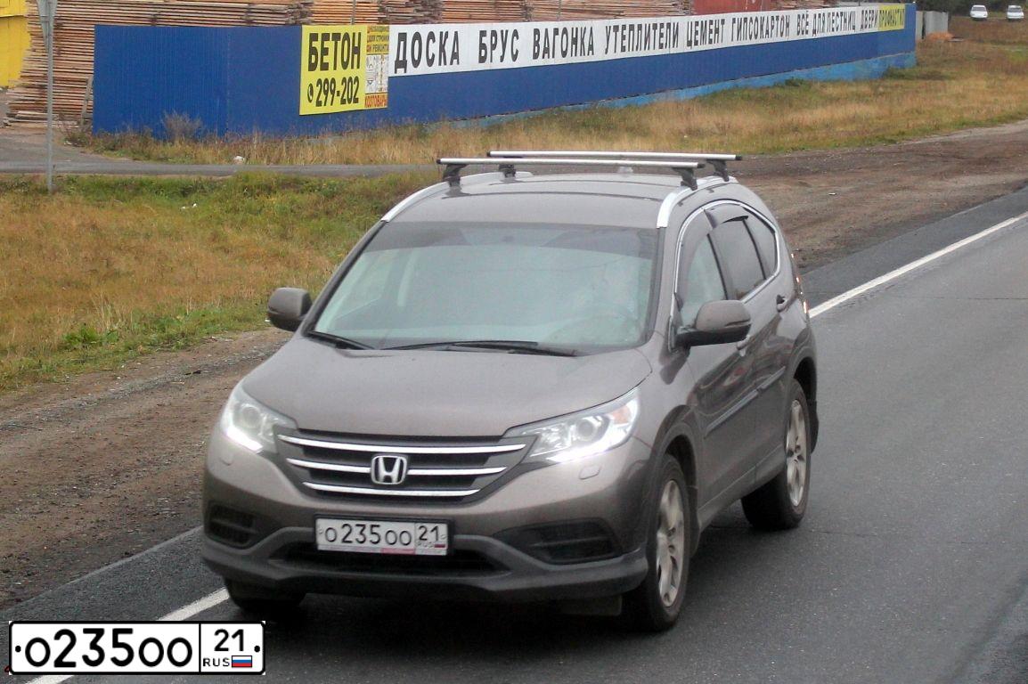 Фото автомобиля HONDA CR-V, 2012 — госномер О235ОО21. Цвет: СЕРО-КОРИЧНЕВЫЙ