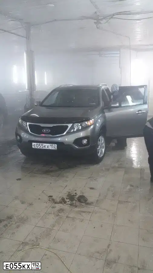 Фото автомобиля MITSUBISHI OUTLANDER, 2003 — госномер Е055КХ152. Цвет: ТЕМНО-СЕРЫЙ