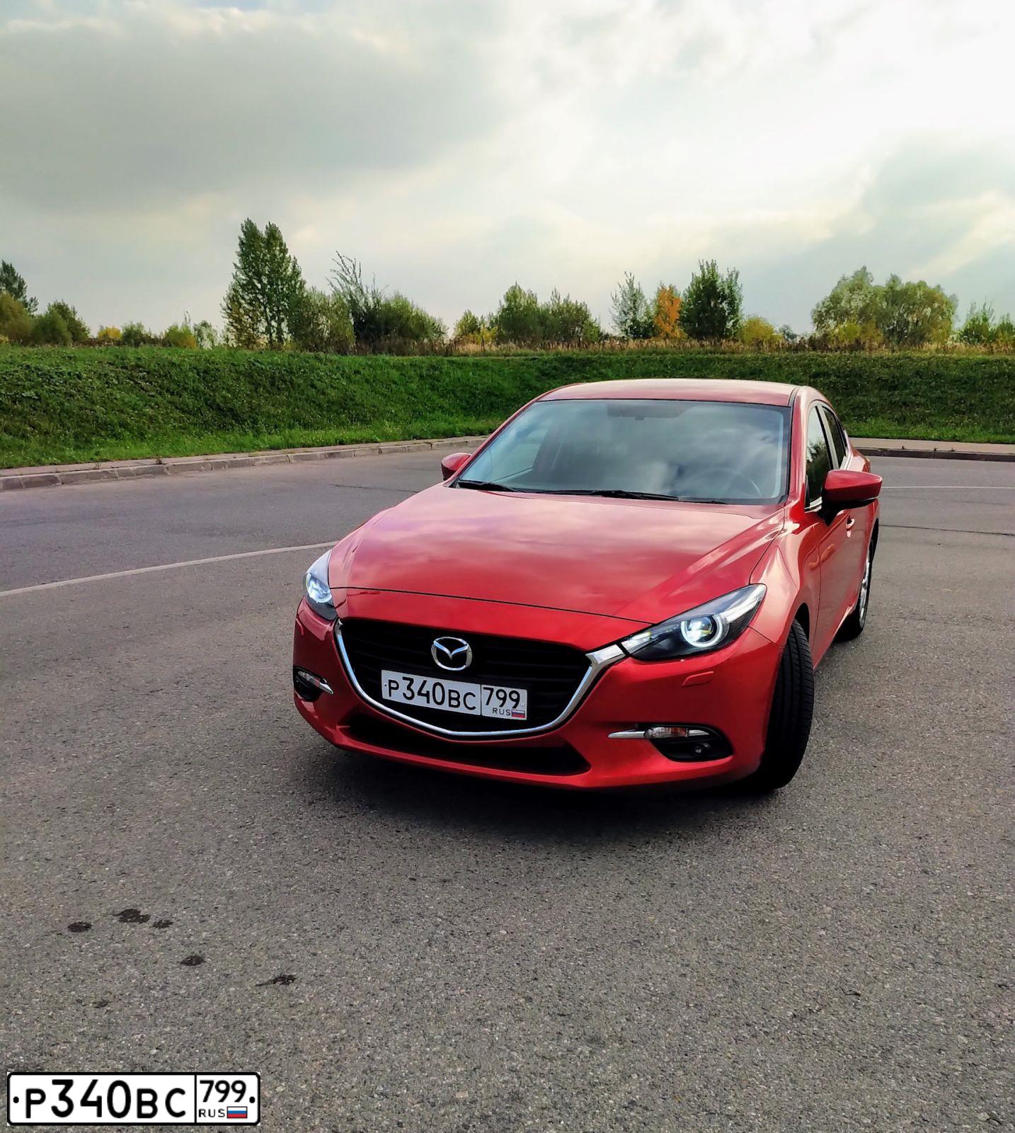 Фото автомобиля MAZDA A 3, 2018 — госномер Е062ТЕ69. Цвет: Красный