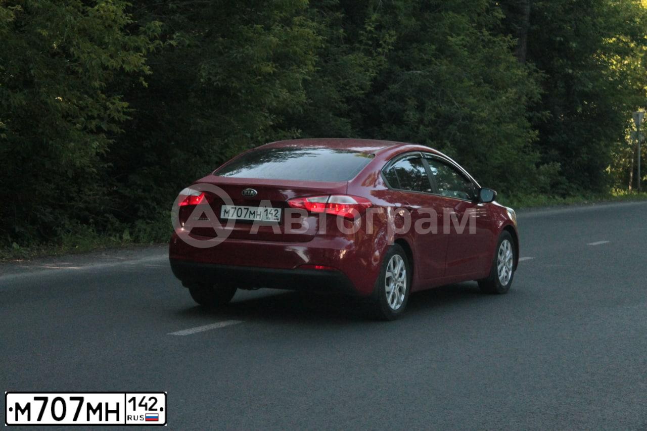 Фото автомобиля KIA CERATO, 2015 — госномер М707МН142. Цвет: Красный