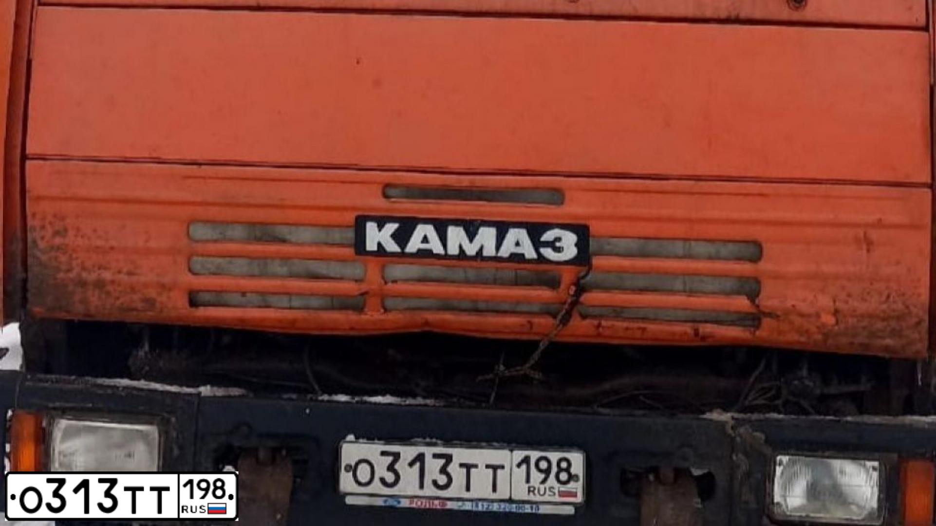 Фото автомобиля KAMAZ 55111 /6X4/, 2004 — госномер О313ТТ198. Цвет: Оранжевый