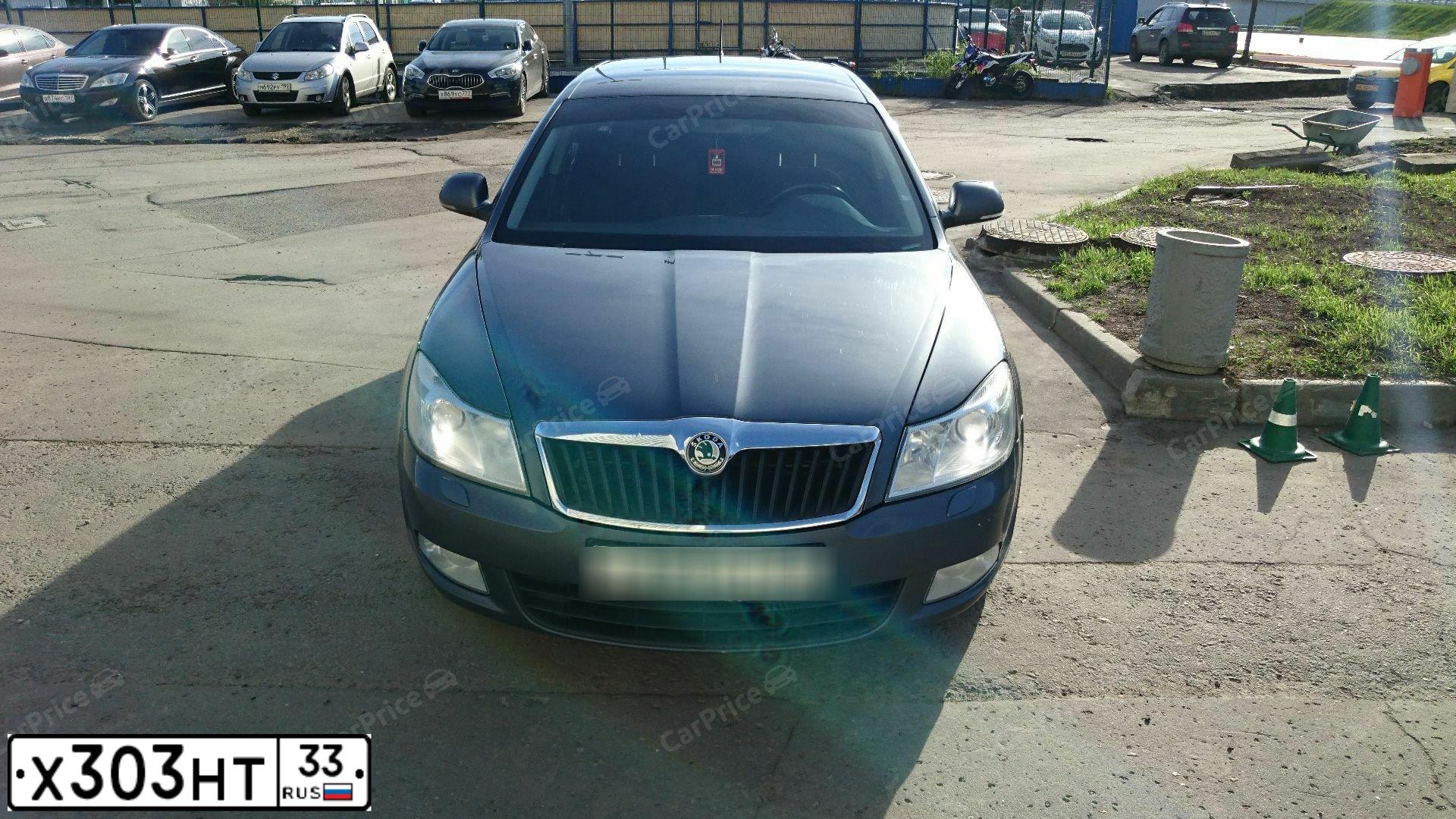 Фото автомобиля SKODA OCTAVIA, 2011 — госномер Х028ЕА790. Цвет: ТЕМНО-СЕРЫЙ