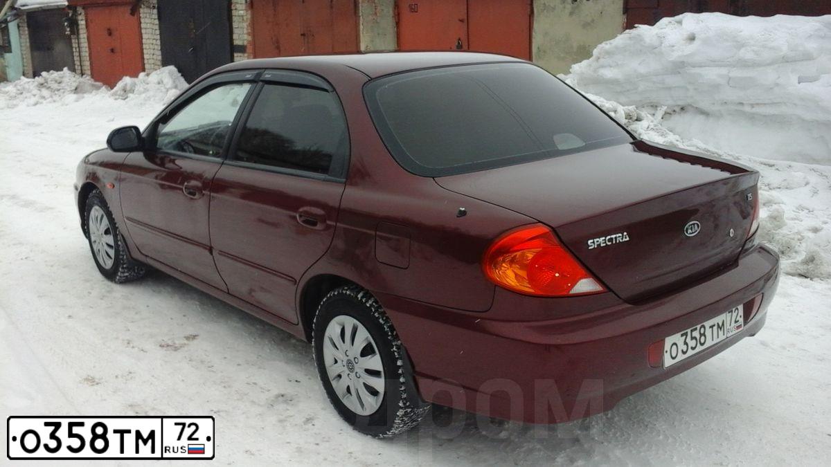 Фото автомобиля KIA SPECTRA, 2006 — госномер Н531ТН72. Цвет: Красный