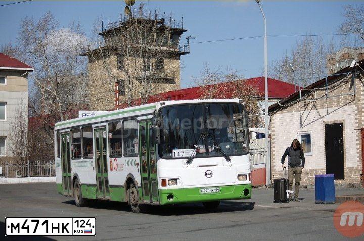 Фото автомобиля LIAZ 5256, 2009 — госномер М471НК124. Цвет: БЕЛЫЙ-ЗЕЛЕНЫЙ