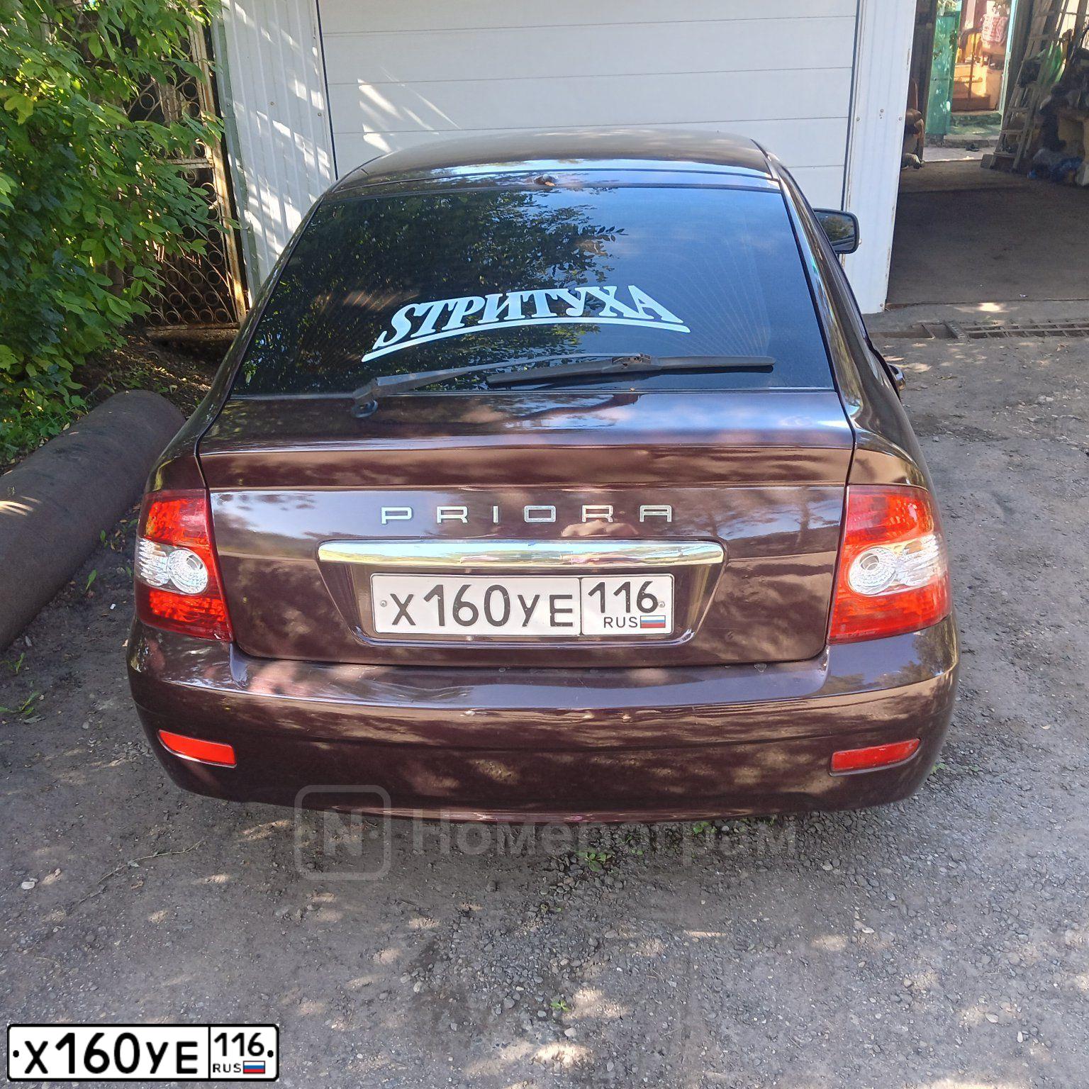 Фото автомобиля LADA 2172 PRIORA, 2011 — госномер Х160УЕ116. Цвет: ТЕМНО-ВИШНЕВЫЙ