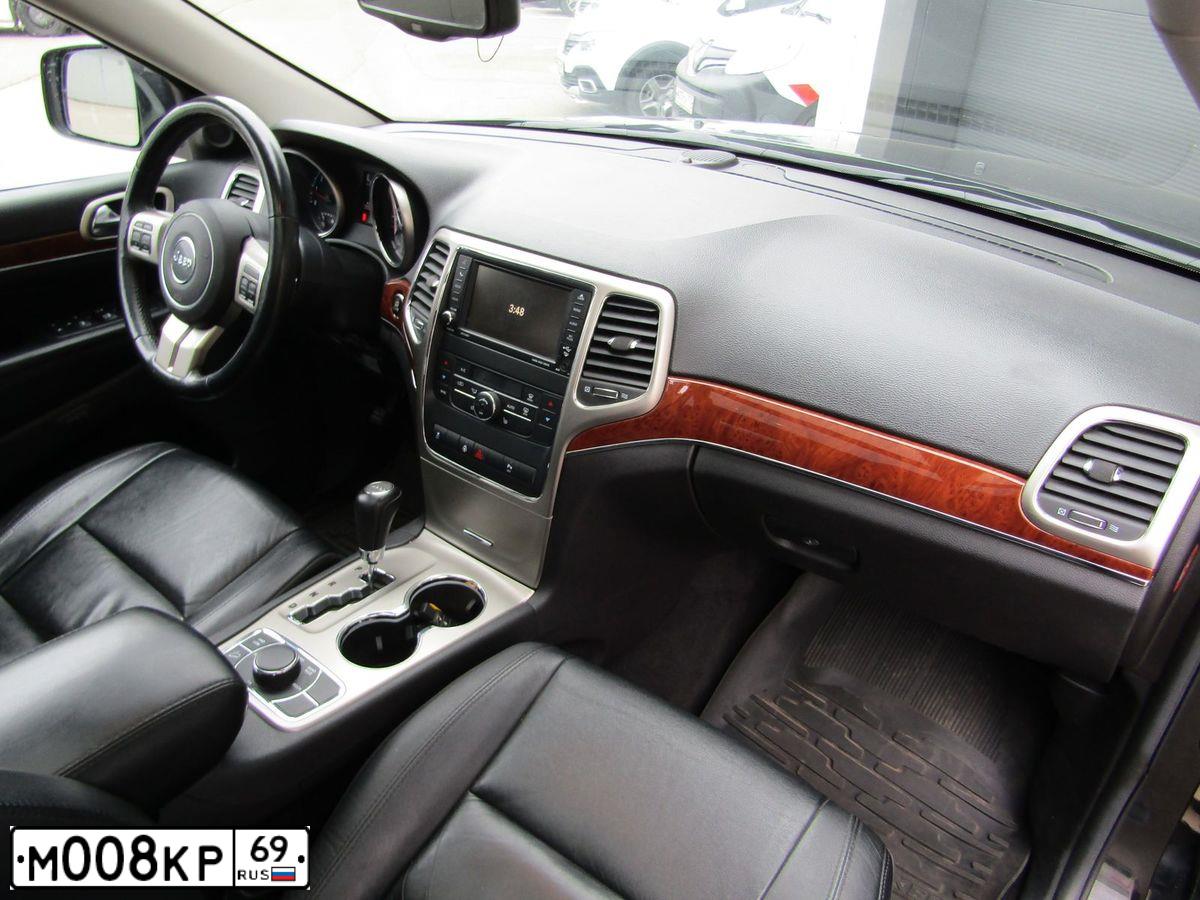 Фото автомобиля JEEP GRAND CHEROKEE, 2012 — госномер Х074ММ197. Цвет: ЧЕРНЫЙ