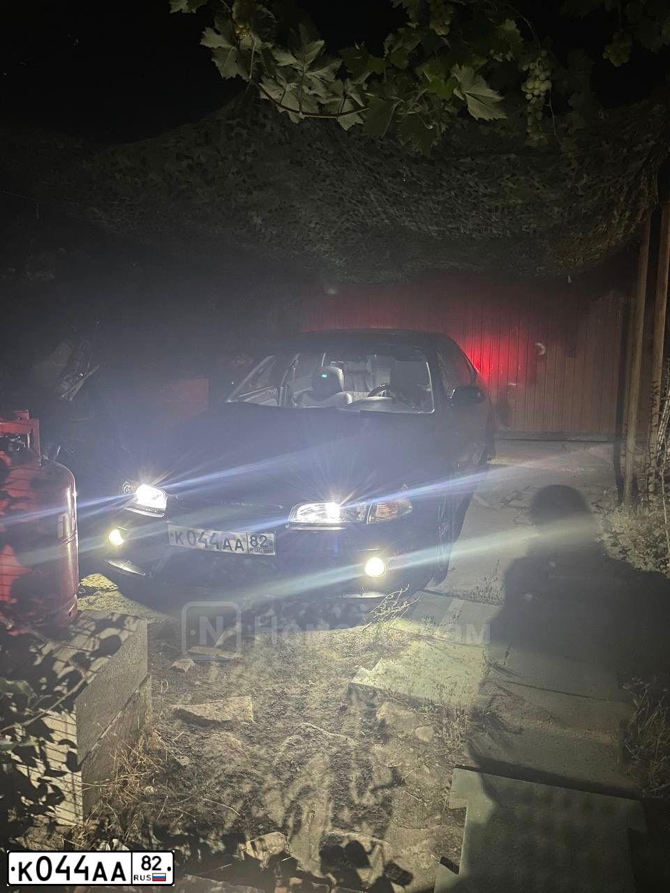 Фото автомобиля MAZDA 626, 1995 — госномер К044АА82. Цвет: синий