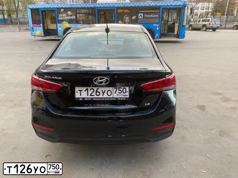 Фото автомобиля HYUNDAI SOLARIS, 2017 — госномер Х525ЕТ152. Цвет: ЧЕРНЫЙ