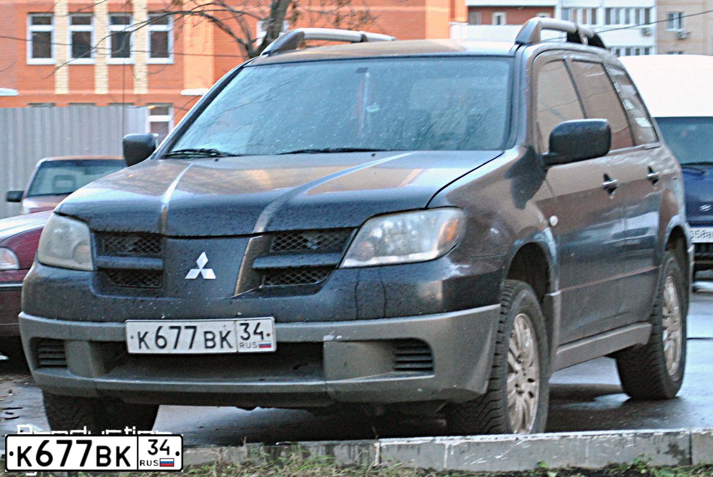 Фото автомобиля MITSUBISHI OUTLANDER, 2003 — госномер Р332РУ11. Цвет: ЧЕРНЫЙ