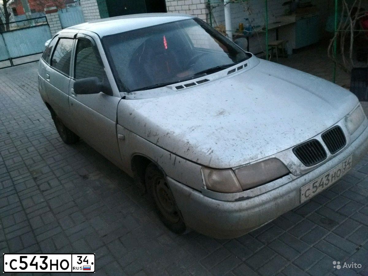 Фото автомобиля LADA 2112, 2003 — госномер А557АА34. Цвет: СЕРЫЙ СВЕТЛЫЙ