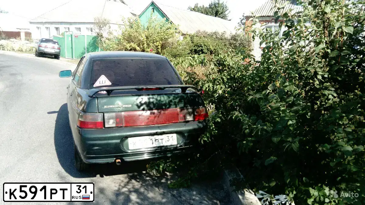 Фото автомобиля VAZ 2110 LADA, 2003 — госномер К591РТ31. Цвет: Темно-зеленый
