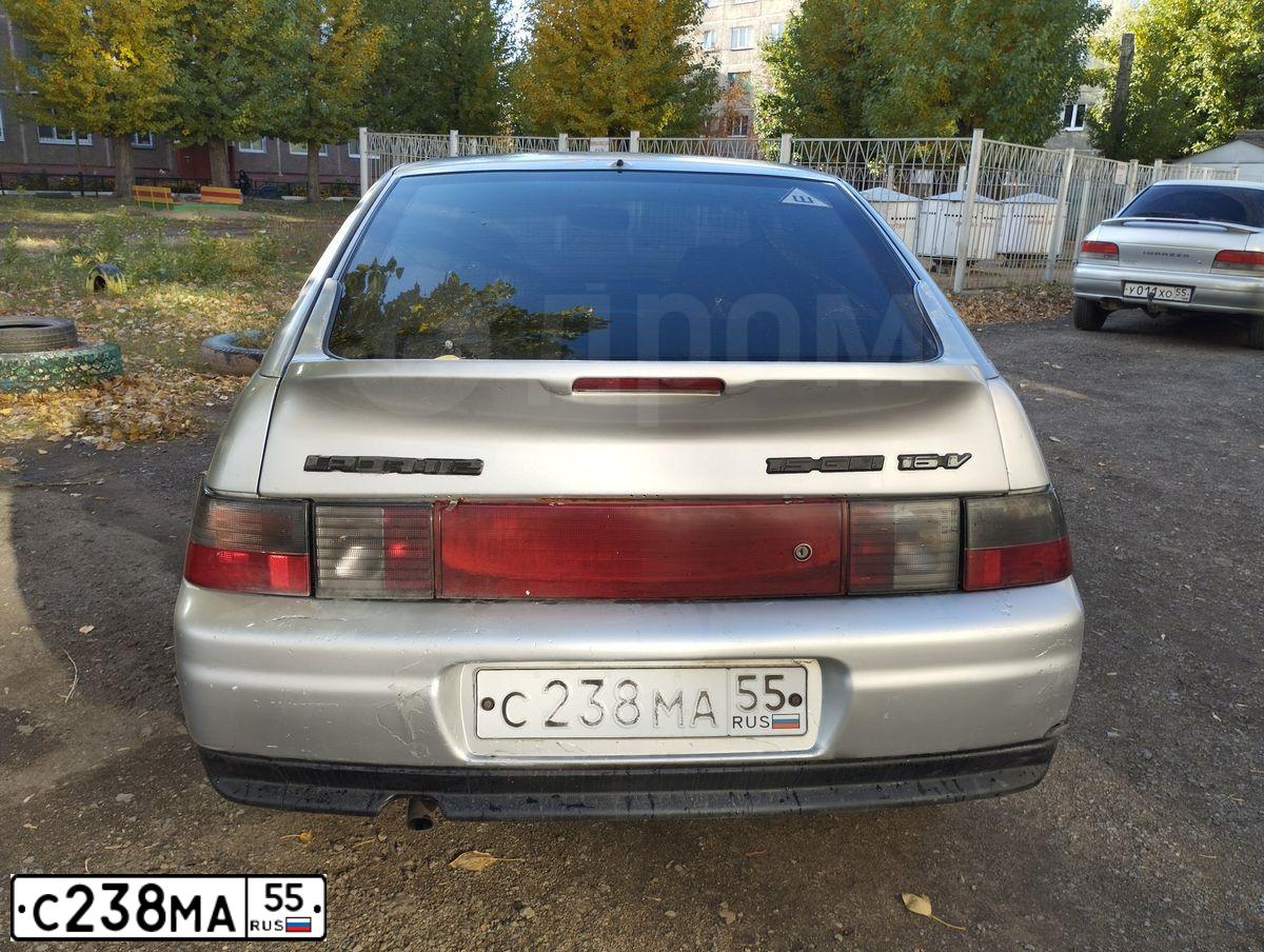 Фото автомобиля LADA 2112, 2002 — госномер С238МА55. Цвет: СВЕТЛО-СЕРЫЙ