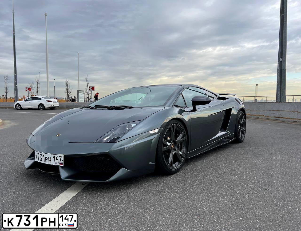 Фото автомобиля LAMBORGHINI I GALLARDO, 2009 — госномер Р299КК178. Цвет: ТЕМНО-СЕРЫЙ