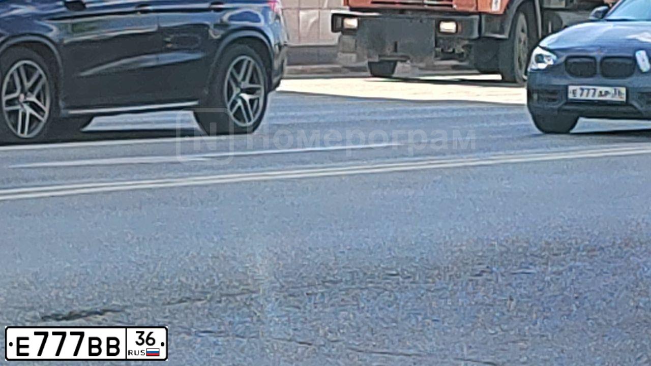 Фото автомобиля GAZ 3110 WOLGA, 2001 — госномер Е777ВВ36. Цвет: БЕЛЫЙ